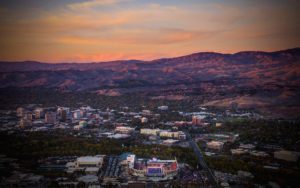 Aerial Photography, Boise State Division 1 Football at Sunset With Downtown Boise and Foothills.